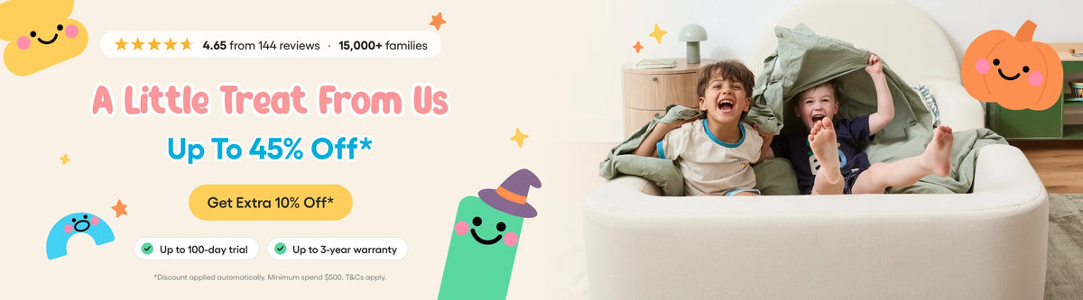 Promotional banner for a baby blanket set, featuring a white round baby blanket on the right with two toddlers lying on it, and a large beige background on the left with text reading 'A Little Treat From Us Up To 45% Off*' and cartoon illustrations.