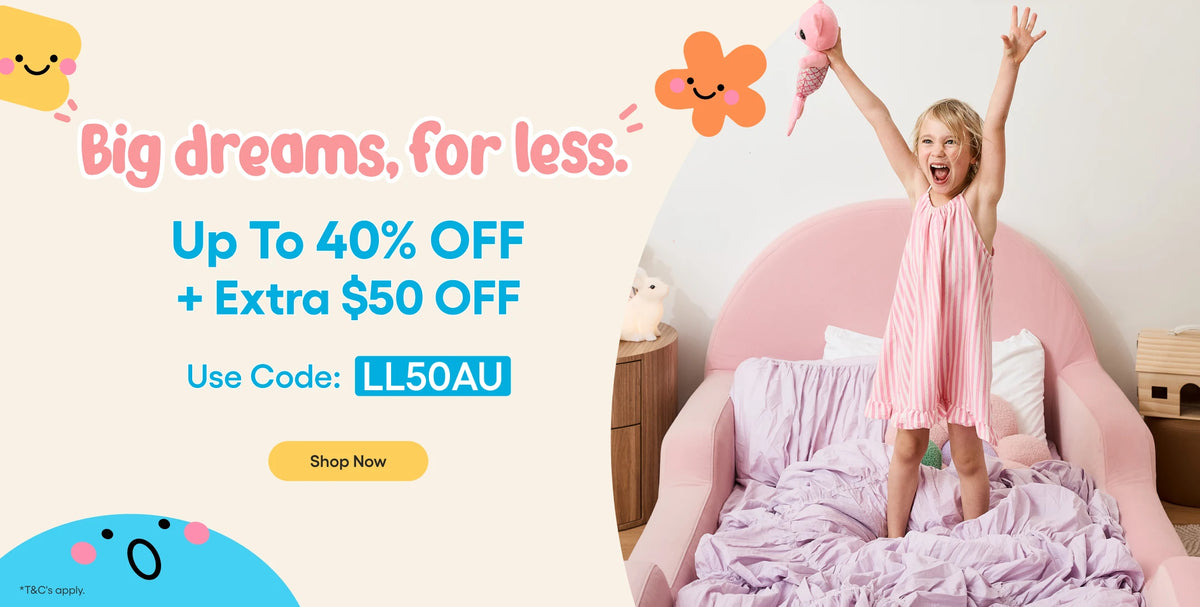A promotional banner with text reading 'Big dreams, for less. Up To 40% OFF + Extra $50 OFF' and 'Use Code: LL50AU' on a cream background, alongside a young girl jumping excitedly on a pink bed in a bedroom.
