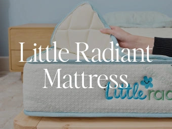 A close-up of a mattress with a hand lifting the corner to show its quilted top, featuring the text 'Little Radiant Mattress' and the brand name 'Little rac' on the side.