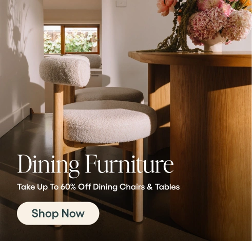 Dining chairs with a wooden table and flowers, promotional text overlay for dining furniture sale.