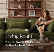 Living room with a woman sitting on a green sofa, promotional text overlay for furniture sale.