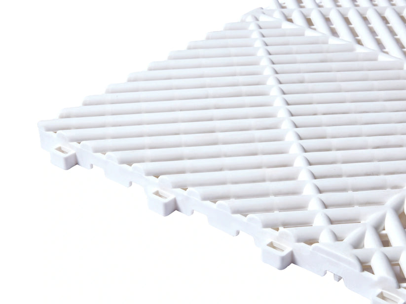 Close-up of the White Cocoon Bed Airflow Pad tile surface and connectors