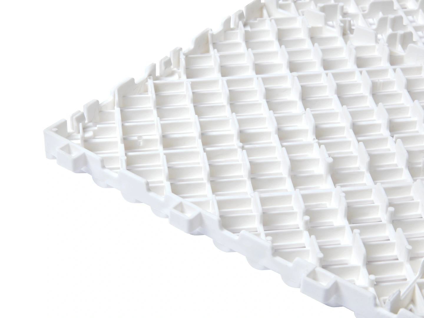 Underside of the White Cocoon Bed Airflow Pad showing raised ventilation channels