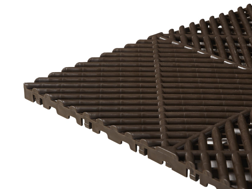 Close-up of the Brown Cocoon Bed Airflow Pad tile surface and connectors