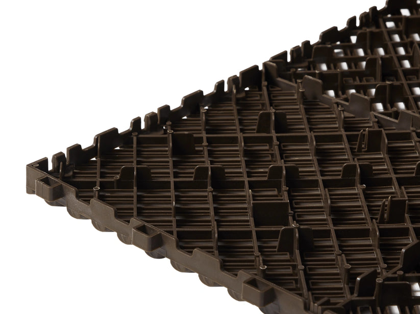 Underside of the Brown Cocoon Bed Airflow Pad showing raised ventilation channels