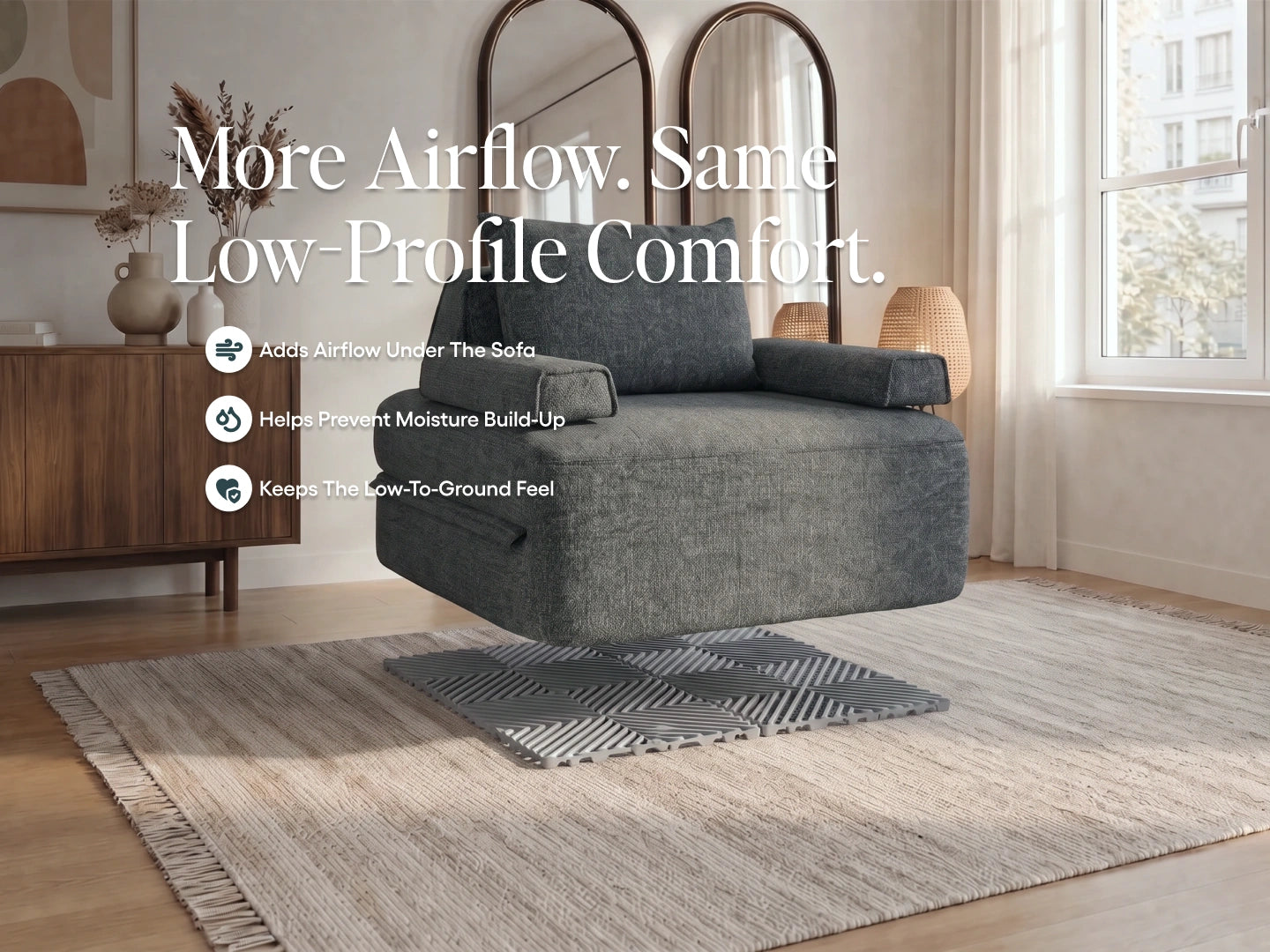 Compact grey Cushie sofa bed over a grey Airflow Pad. Adds airflow, helps prevent moisture build-up and keeps a low profile.
